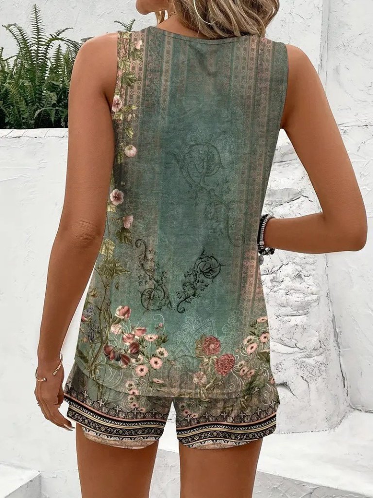 Women's Strappy Round Neck Floral Print Peplum Blouse and Shorts Set