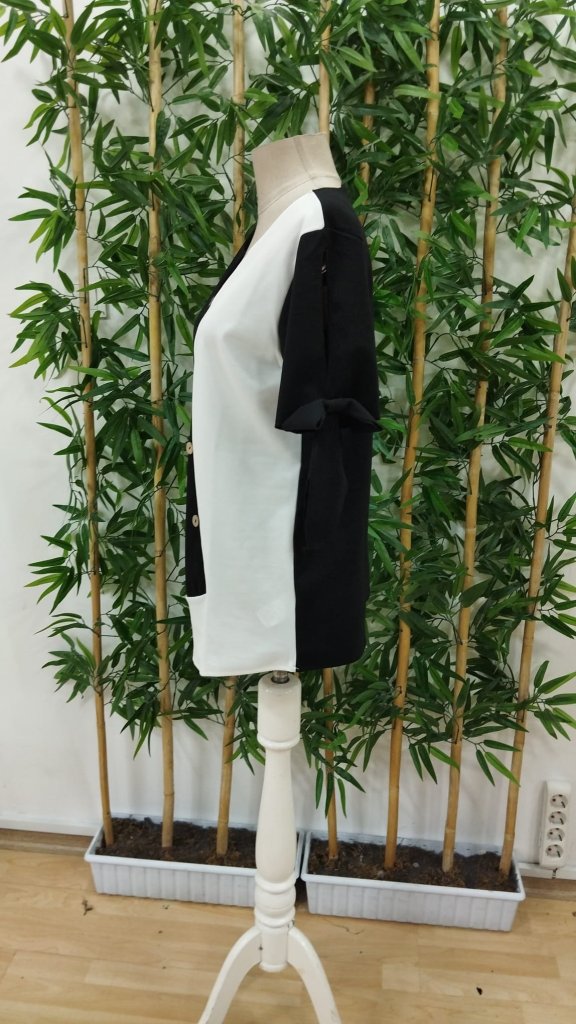 Women's Short Sleeve Tie-Front Asymmetrical Hem Two-Tone Detail Buttoned Imported Crepe Blouse